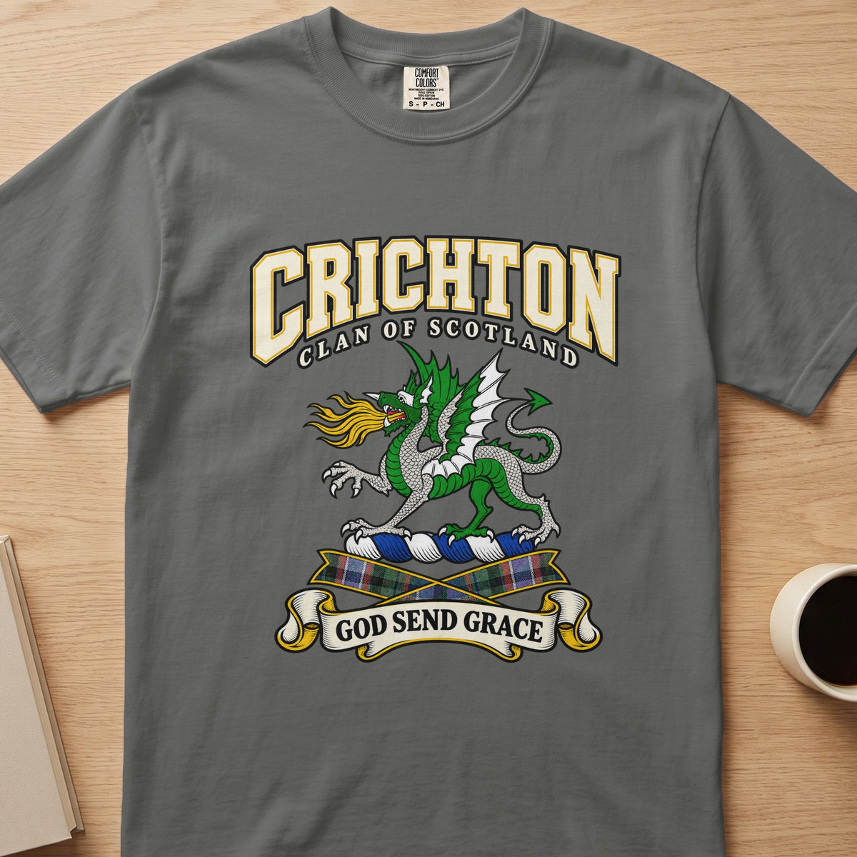 Crichton green dragon and tartan accents graphic on a charcoal gray Comfort Colors T-shirt, front view