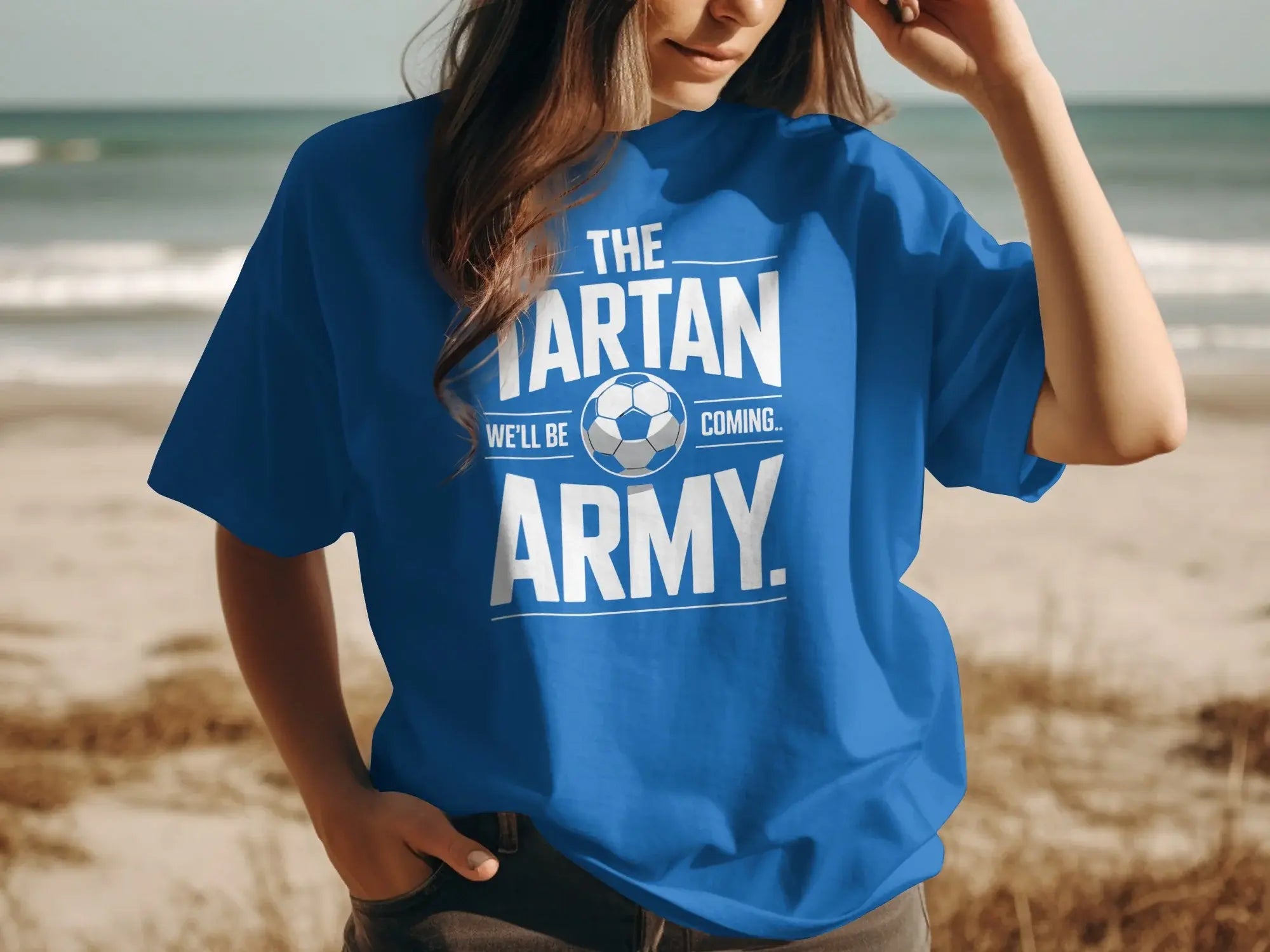 Blue t-shirt with "The Tartan Army we'll be coming" and soccer ball graphic.