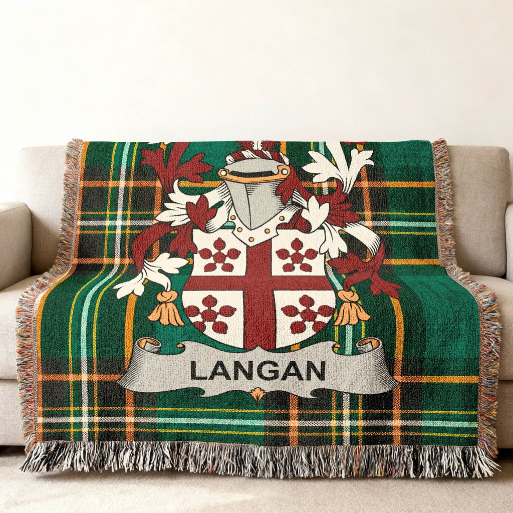 Green tartan throw blanket with Langan family crest.