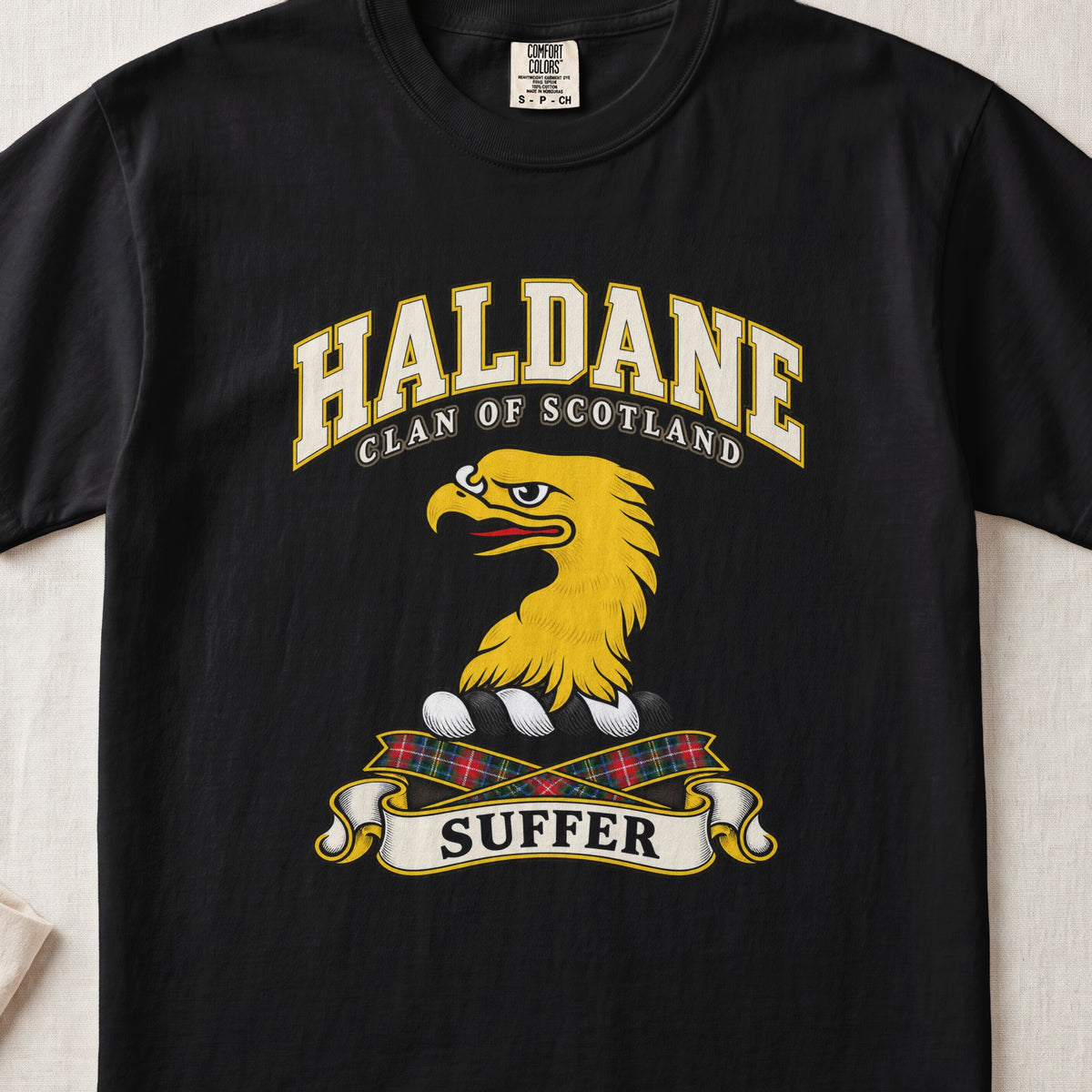 Haldane Scottish clan T-shirt in Black, front view with a gold eagle head and motto design.