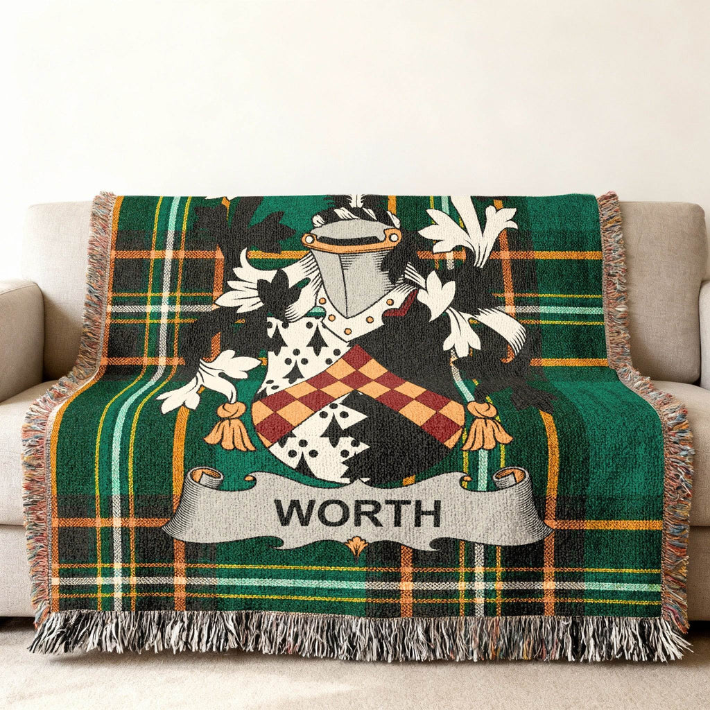 Green tartan blanket with a coat of arms and the name "WORTH".
