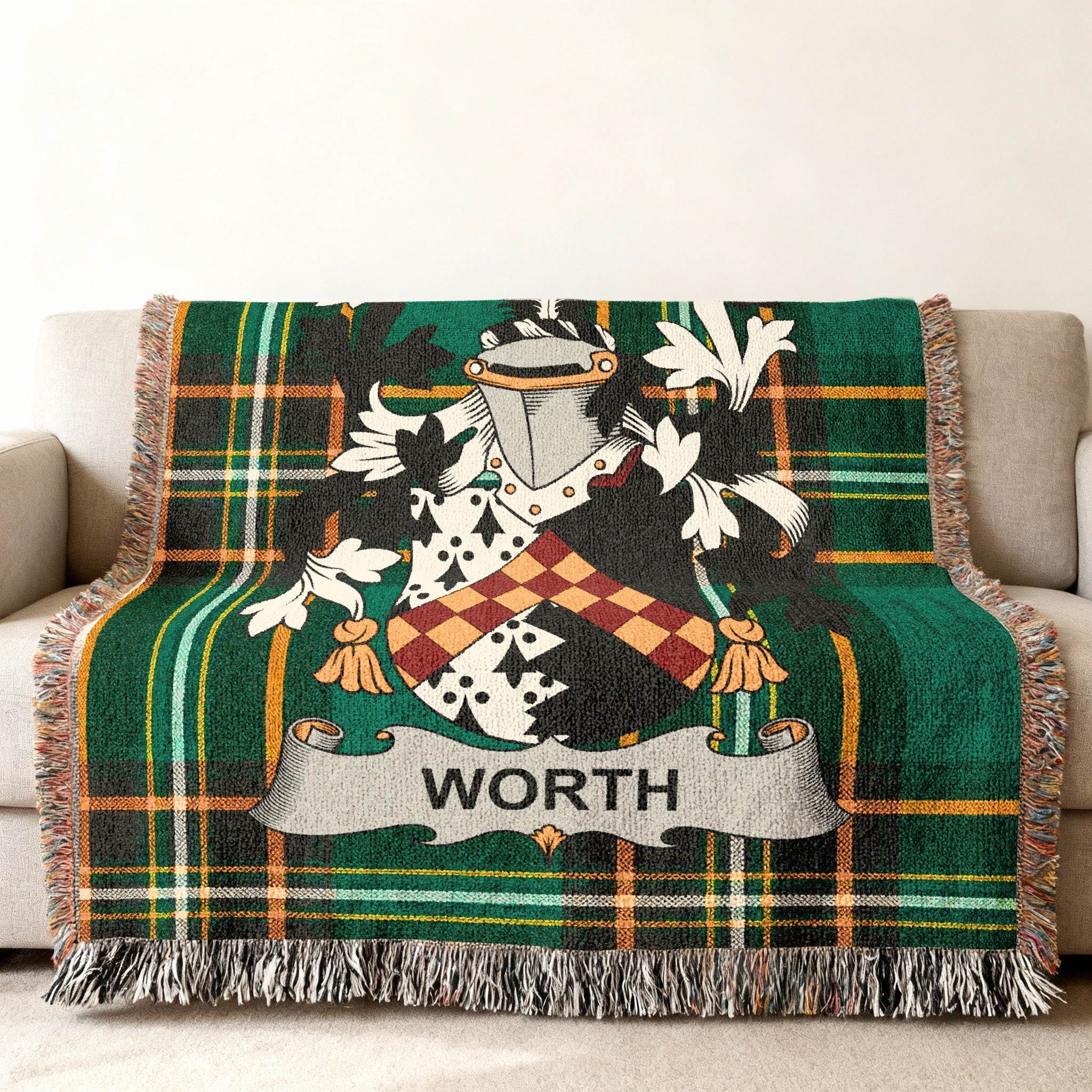 Green tartan blanket with a coat of arms and the name "WORTH".