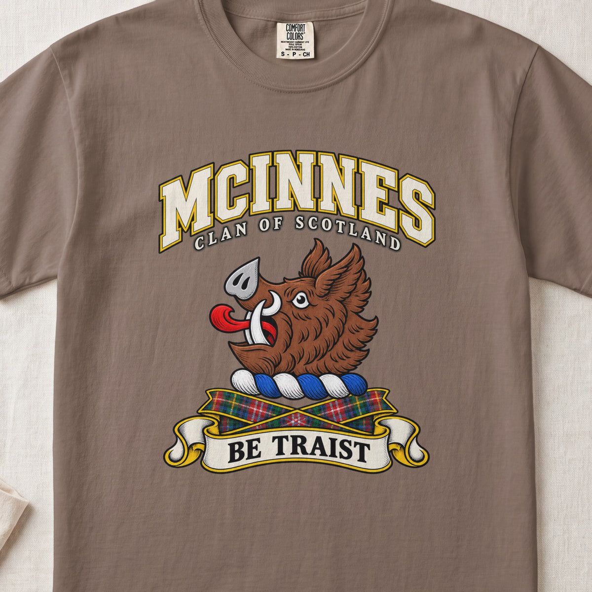 McInnes Scottish clan T-shirt in Espresso, front view with a brown boar head and motto design.