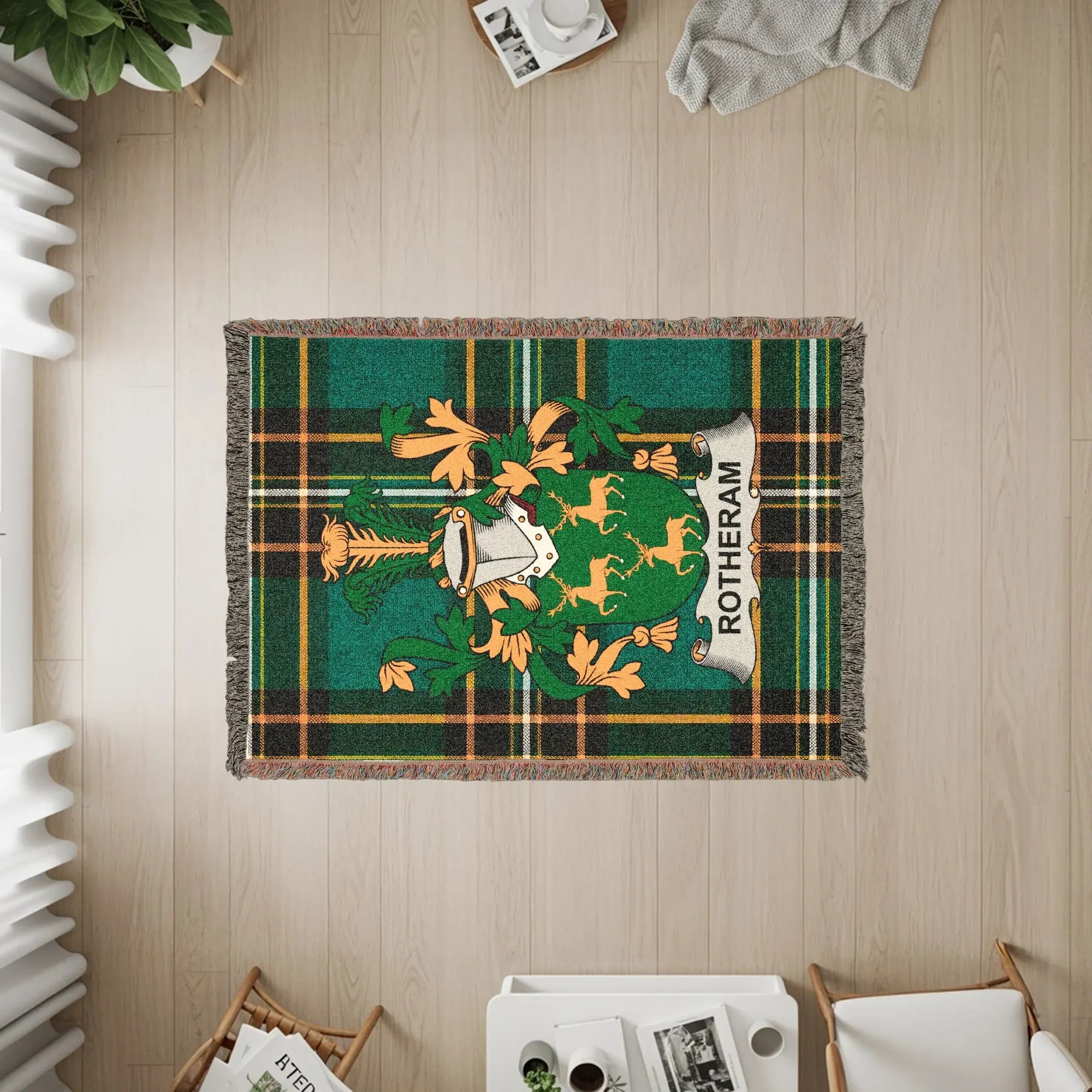 Green and gold plaid throw blanket with the Rotherham crest.
