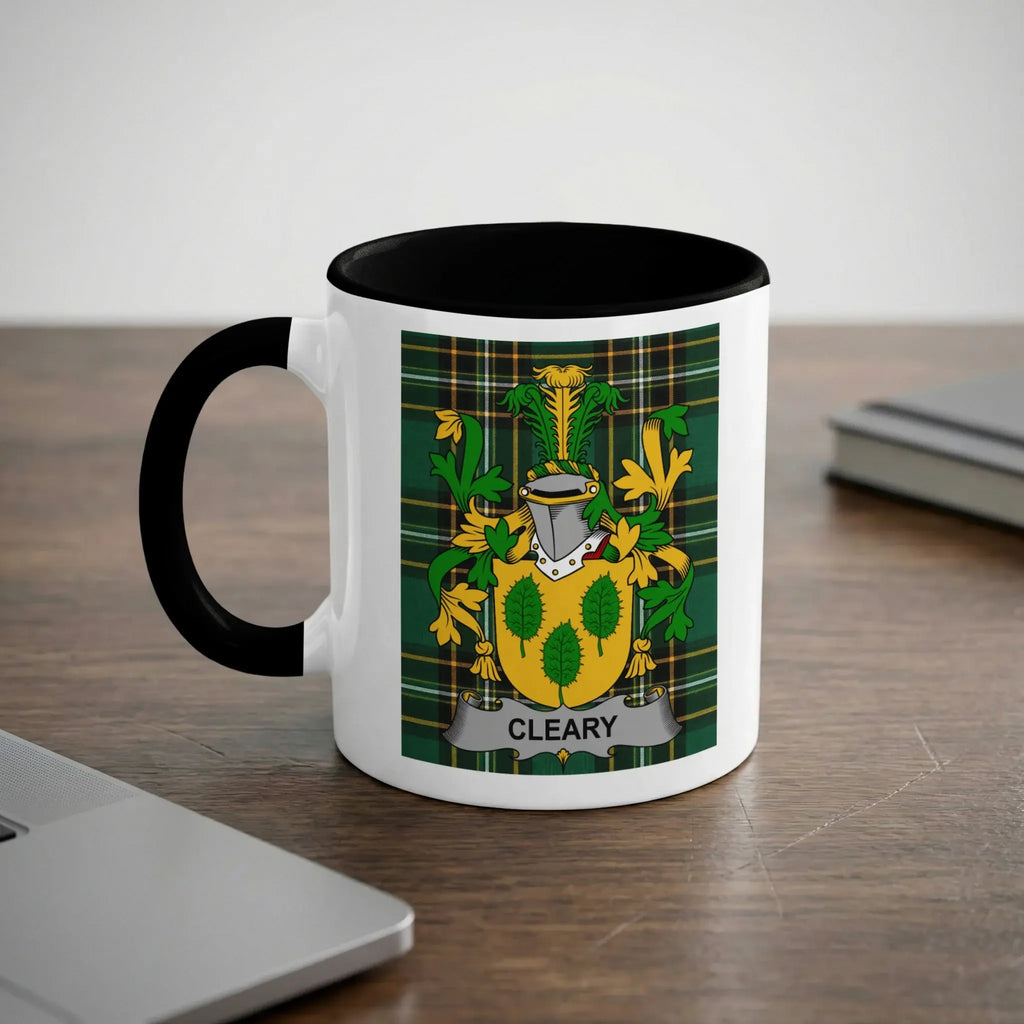 White mug with black handle featuring a green plaid coat of arms with the name CLEARY.