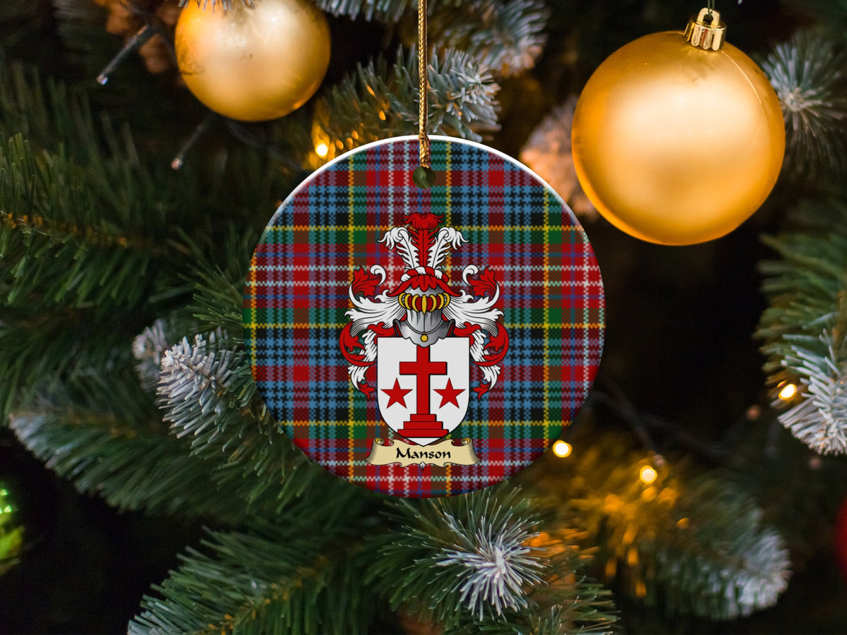 Manson family emblem ceramic Christmas ornament with Caledonia tartan background in festive holiday décor