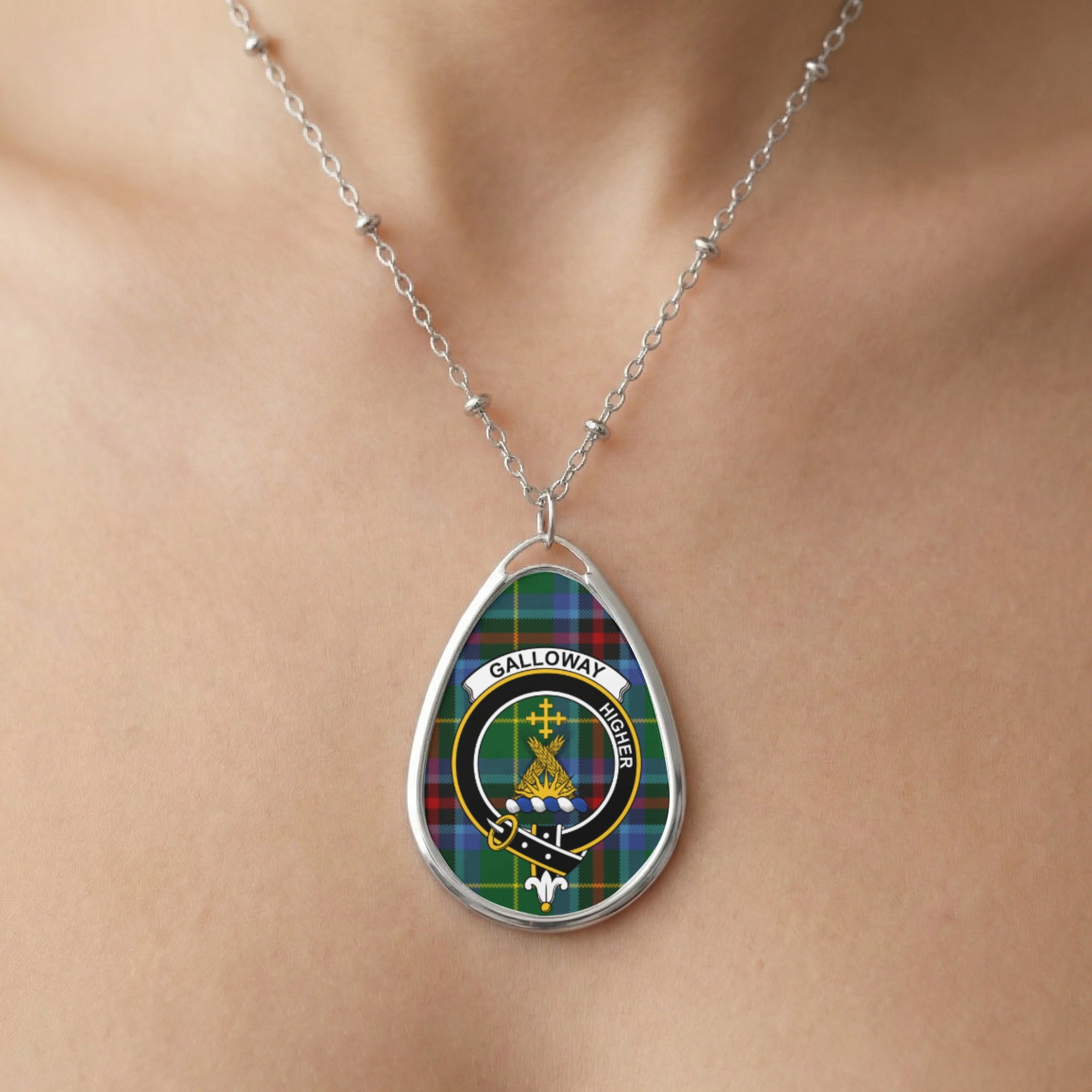 Close-up of Galloway clan tartan pendant necklace with crest design