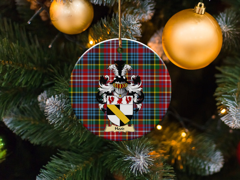 Hood family emblem ceramic Christmas ornament with Caledonia tartan background in festive holiday décor