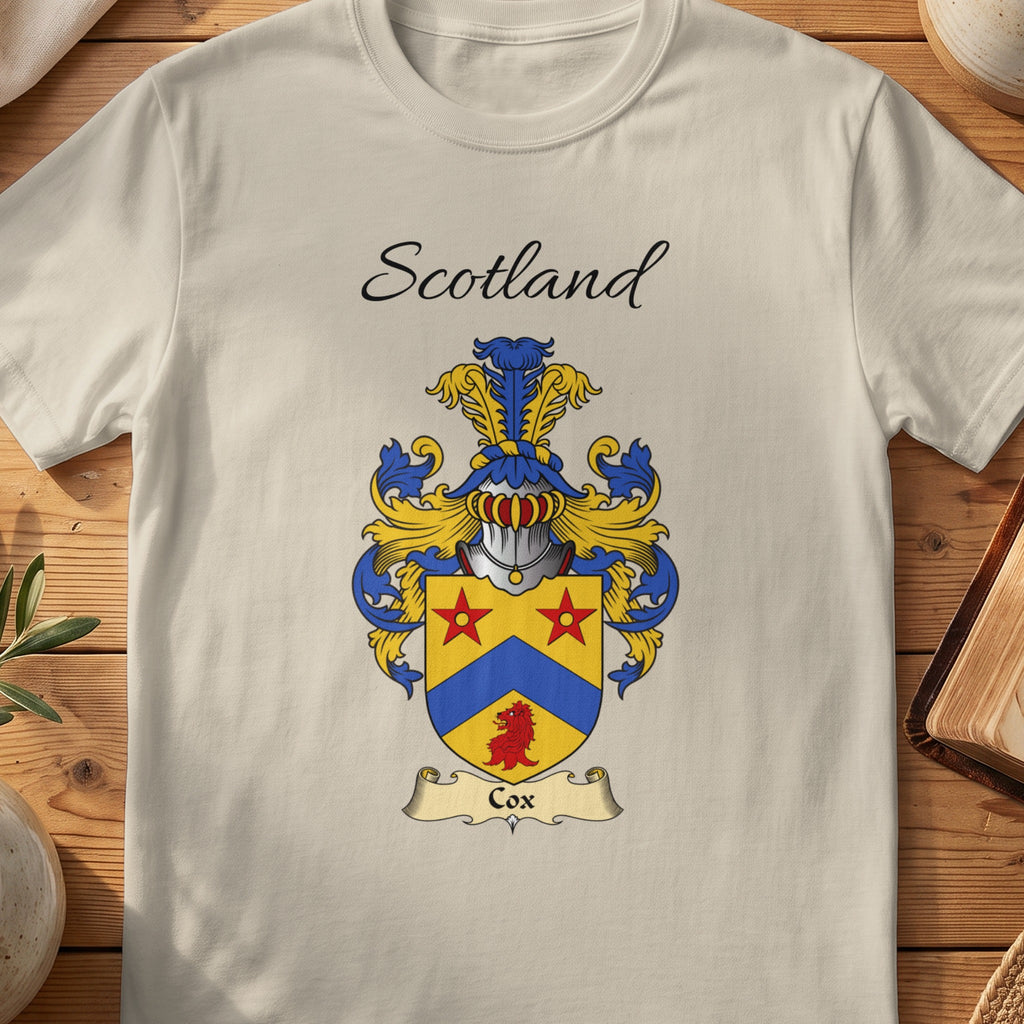 Sand Cox Scottish family shield T-shirt featuring a blue chevron and red stars on gold