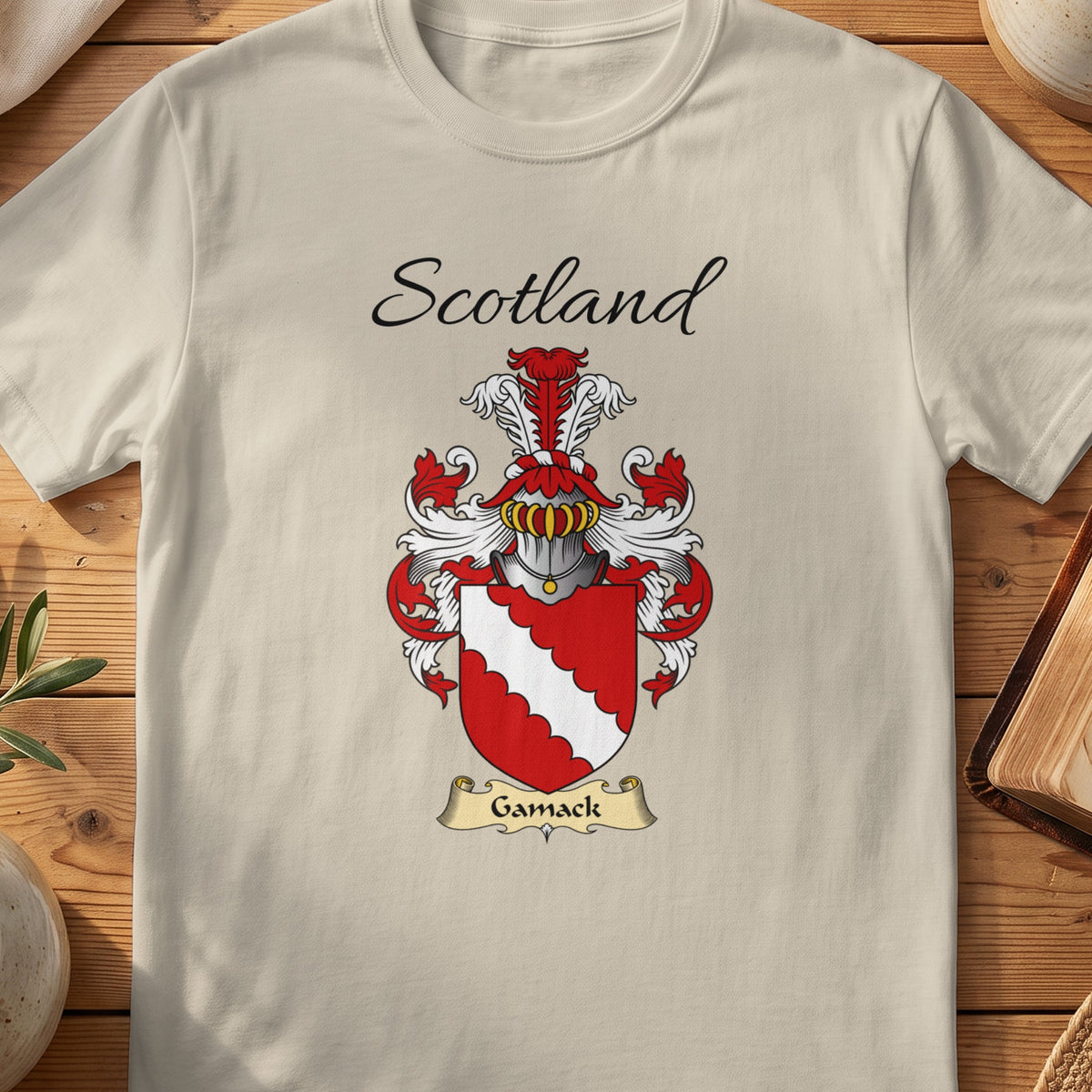 Sand Gamack Scottish family shield T-shirt featuring a white scalloped diagonal band on red