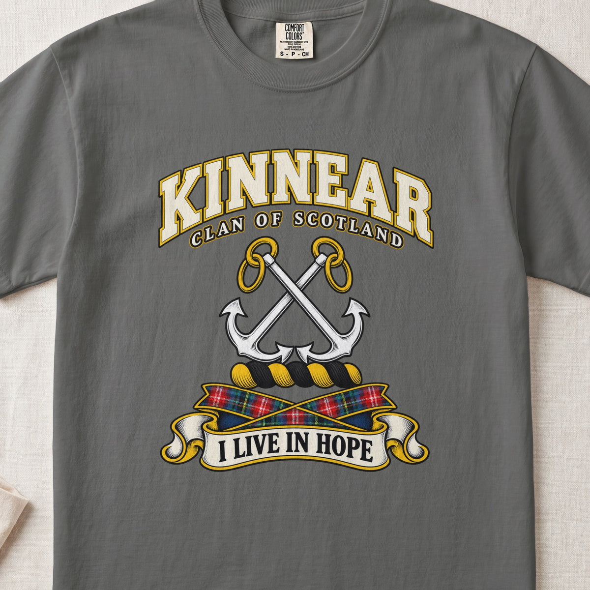 Kinnear Scottish clan T-shirt in Pepper, front view with crossed silver anchors and motto design.