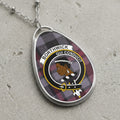 Borthwick clan Scottish tartan necklace with clan crest and Qui Conducit motto on tartan background