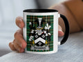 Mug with "RICHARDS" family crest on a green plaid background.