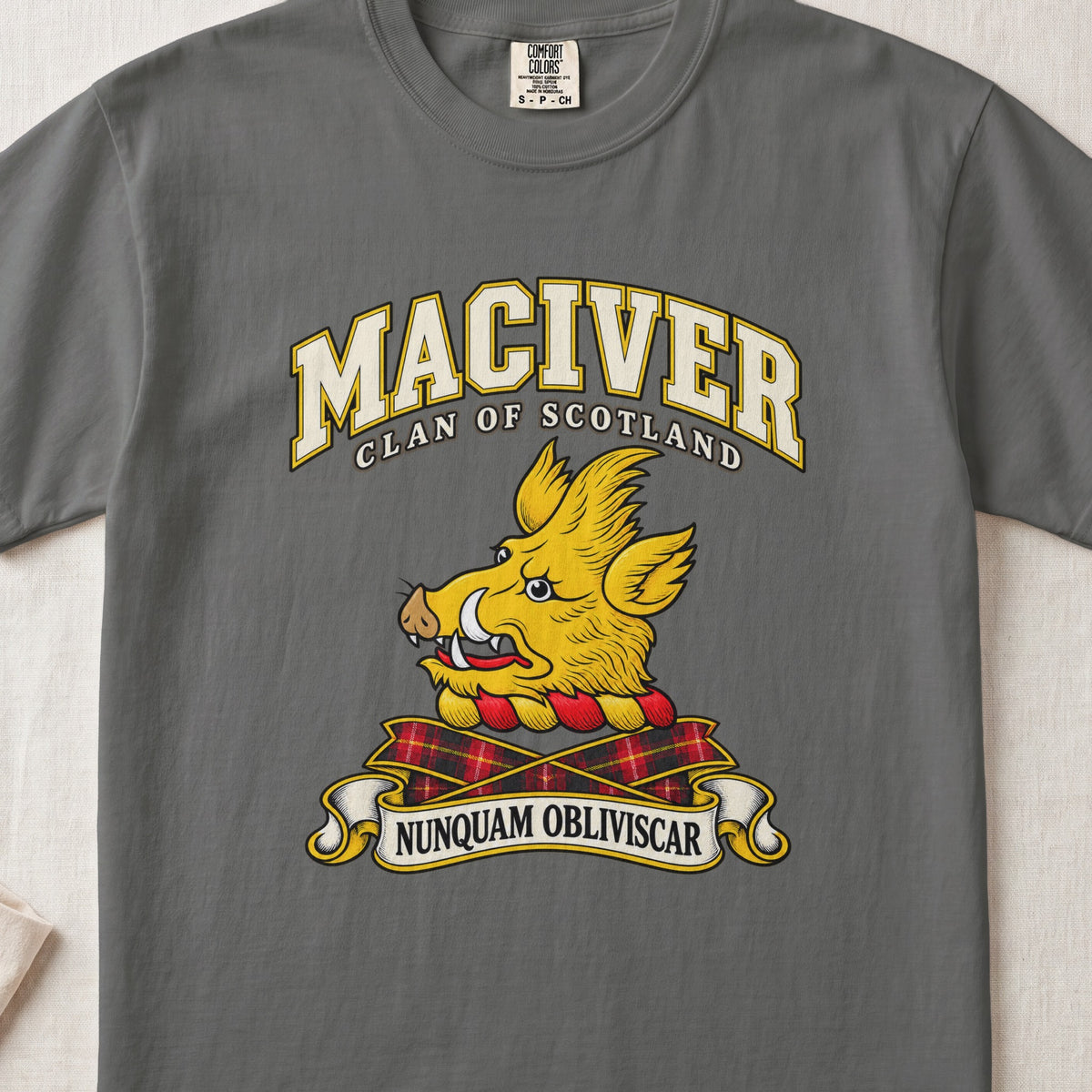 MacIver Scottish clan T-shirt in Pepper, front view with a golden boar head and motto design.