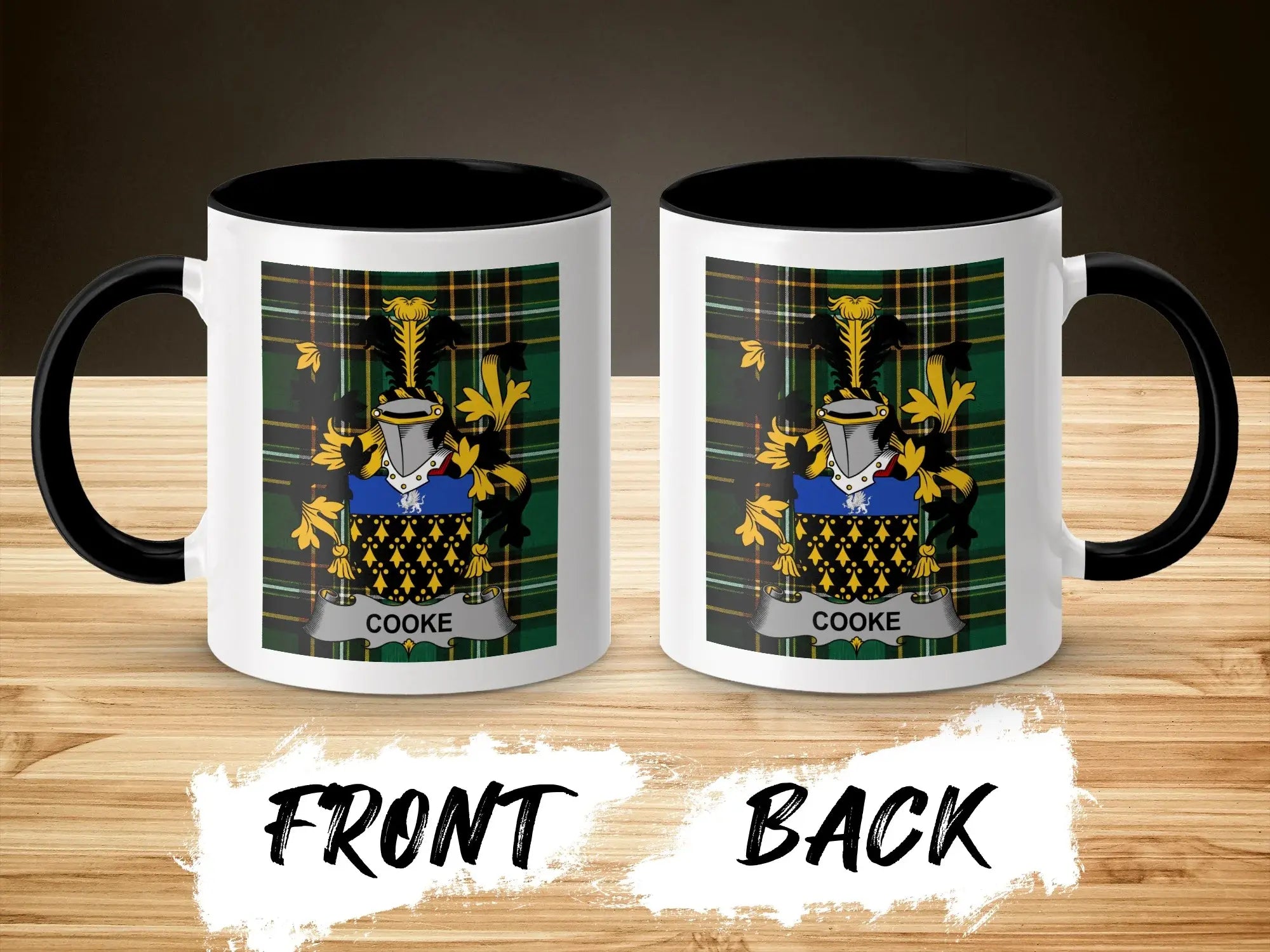 White mug with black handle features "COOKE" family crest on front and back.