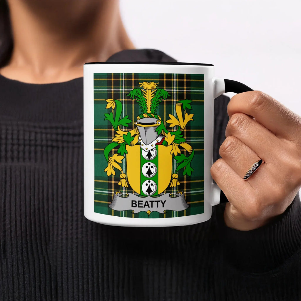 Mug featuring the Beatty family crest on a green, black, and yellow plaid background.