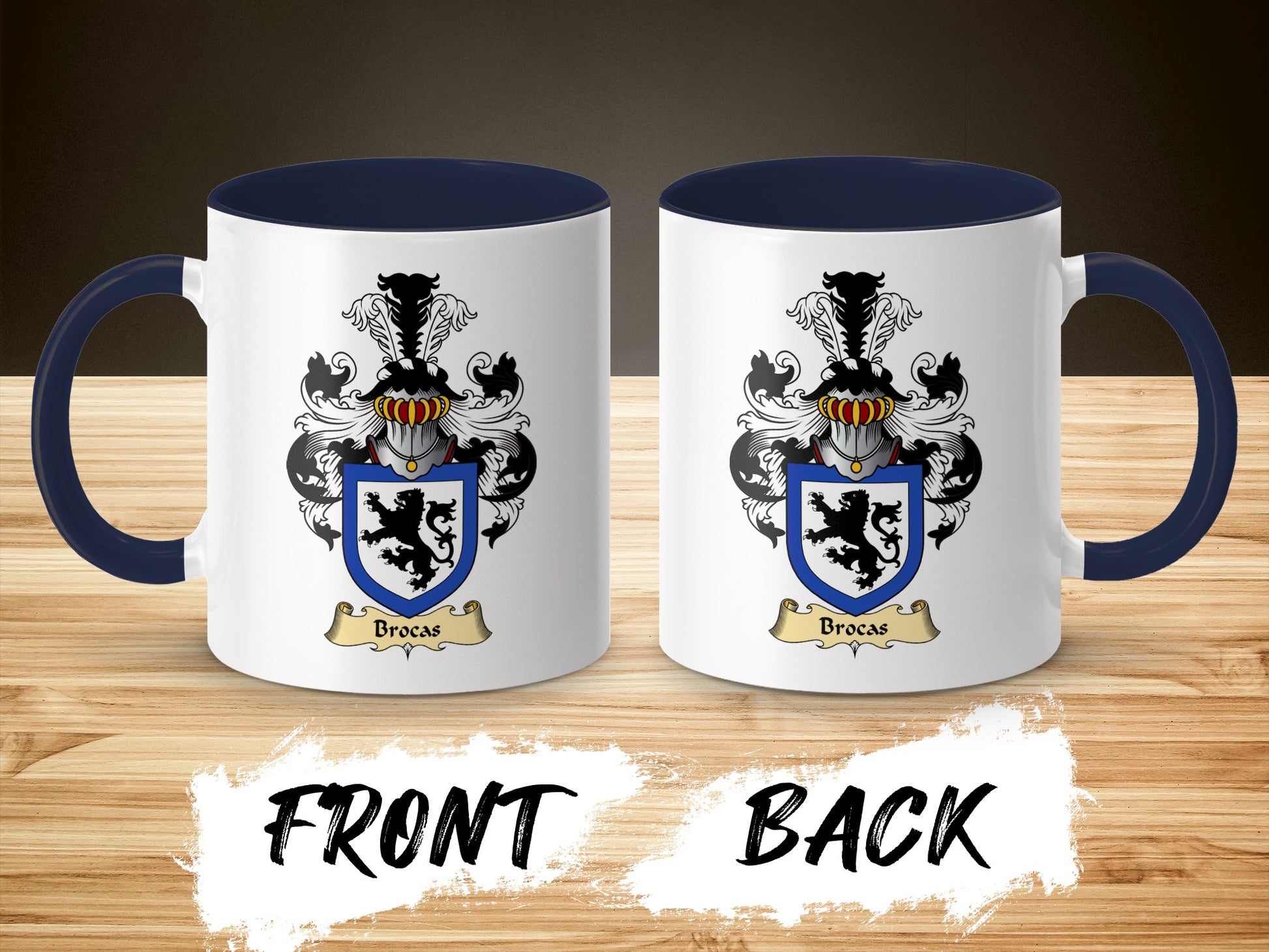 Two white mugs with navy blue handles and rims, displaying a family crest with a lion.