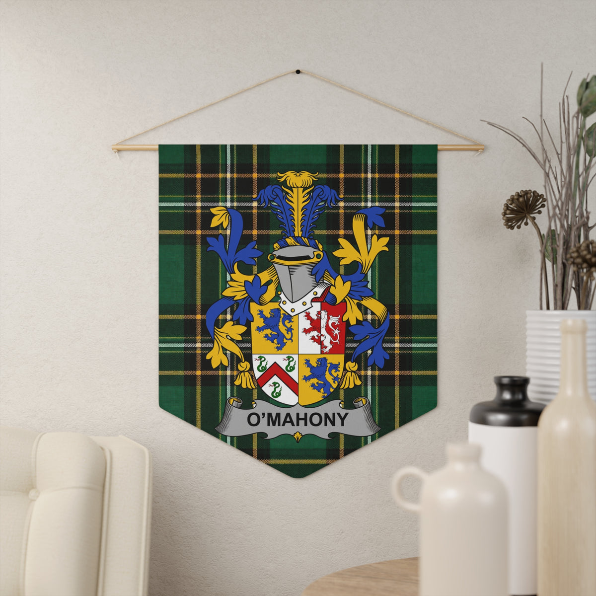 O'Mahony tartan banner with coat of arms hanging on a textured wall.