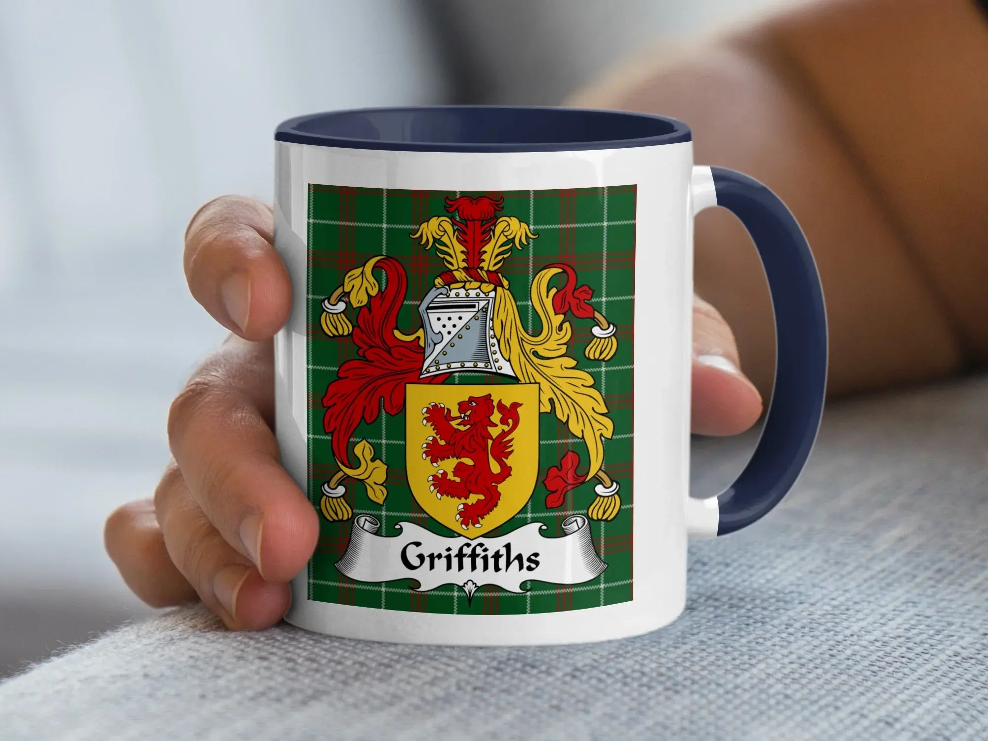 Griffiths Welsh family crest mug with navy handle and coat of arms on tartan