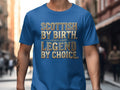 Blue t-shirt with "Scottish By Birth. Legend By Choice." text.