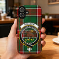 Clan Pollock tartan phone case — full 3D wrap with Audacter et Strenue crest, glossy finish on iPhone