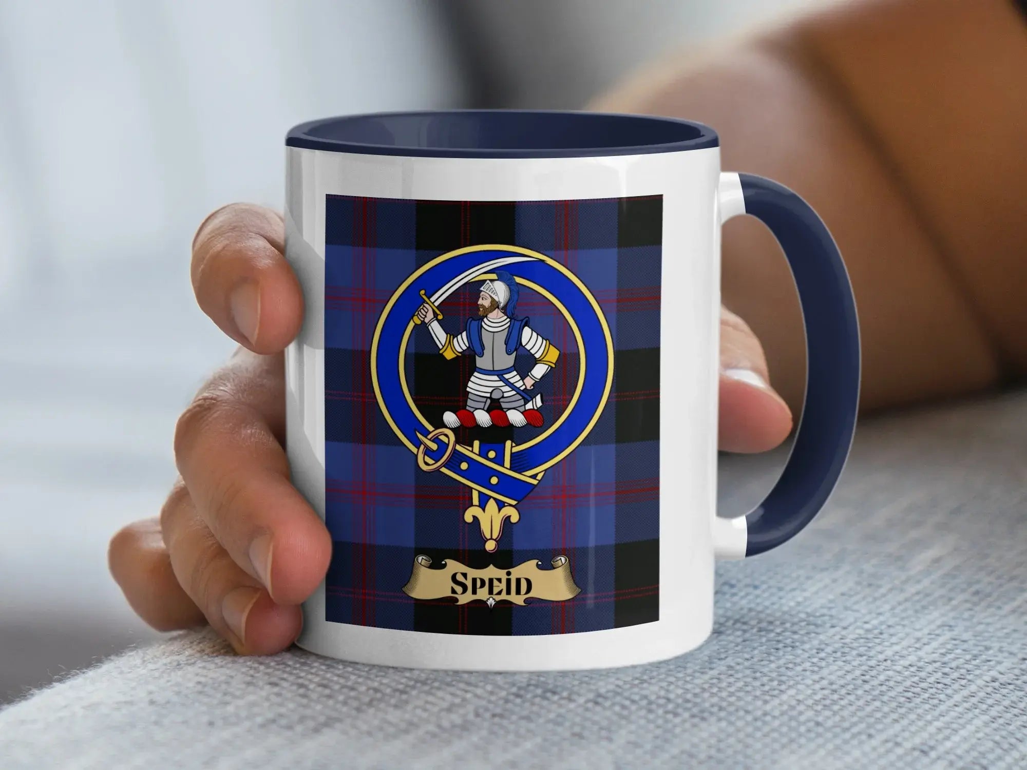 Speid family crest coffee mug with a tartan-background design