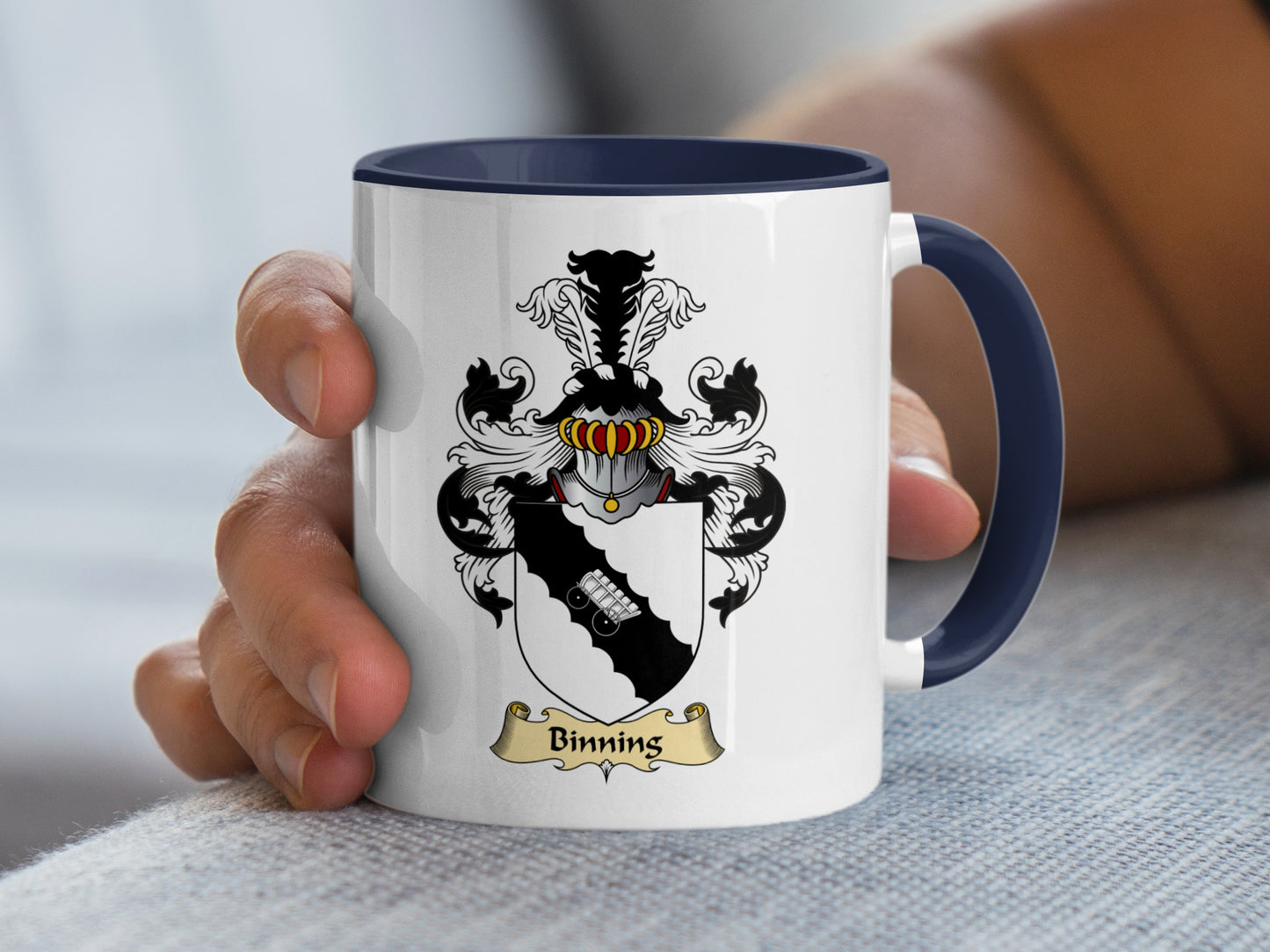 White mug with blue handle featuring the Binning family crest.