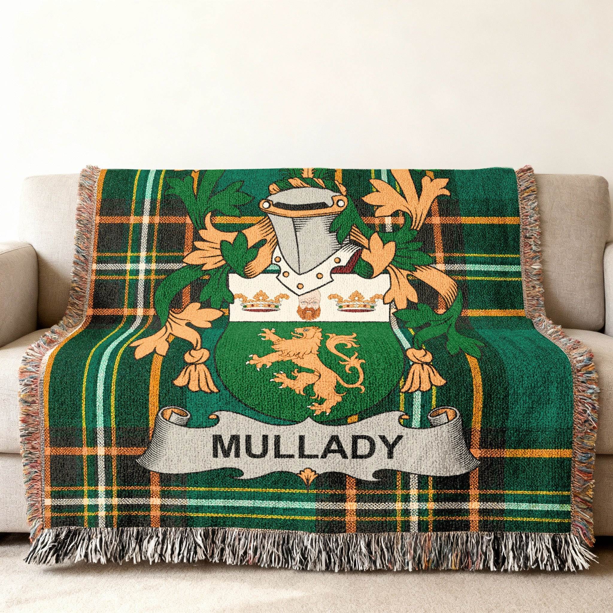 Green plaid throw blanket with Mullady family crest.