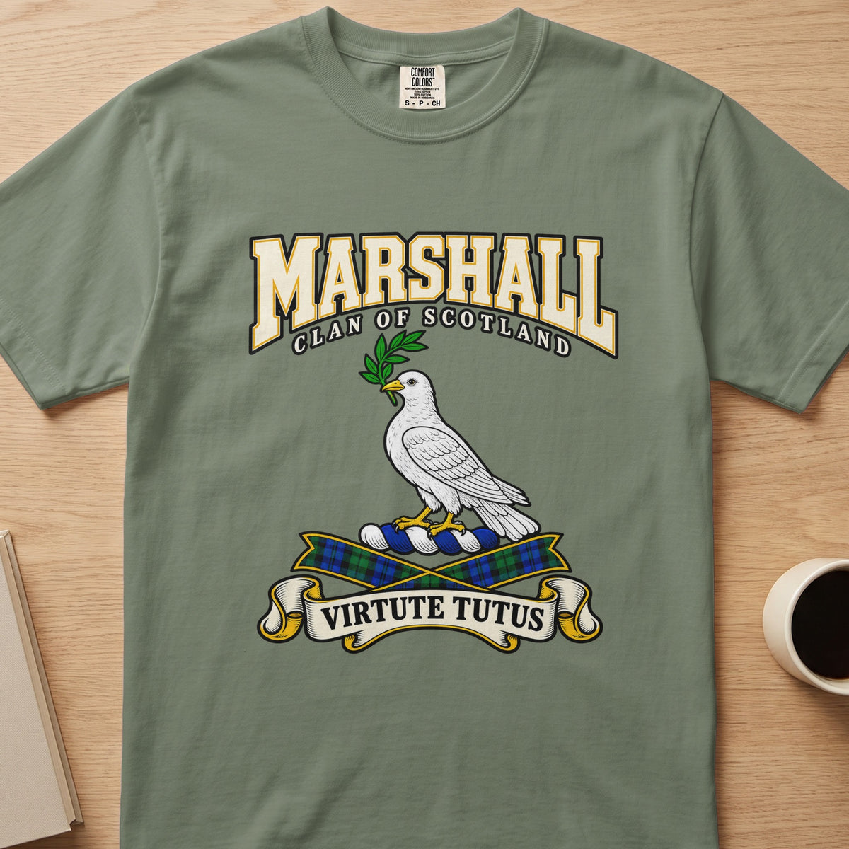 Marshall clan T-shirt in sage green, front view with white bird holding a green sprig