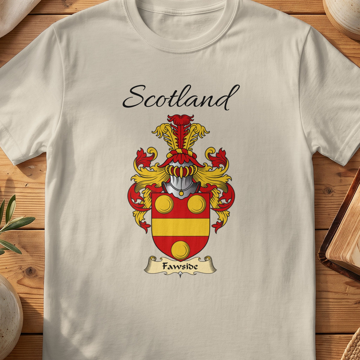 Sand Fawside Scottish family shield T-shirt featuring gold circles above a gold horizontal band