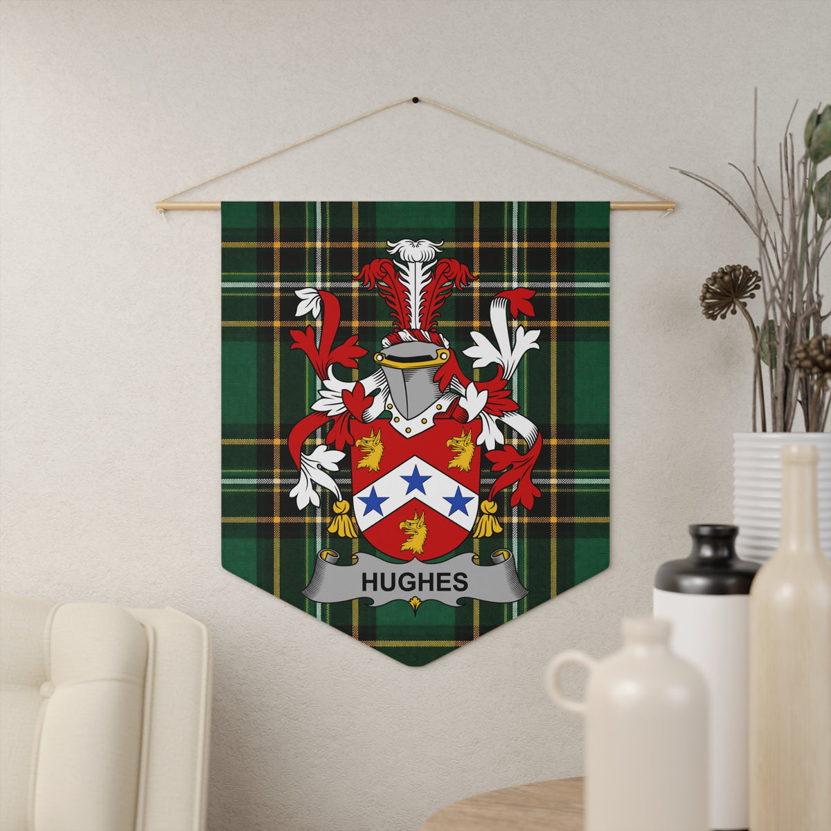 Hughes family crest displayed on a green plaid banner with a silver scroll.