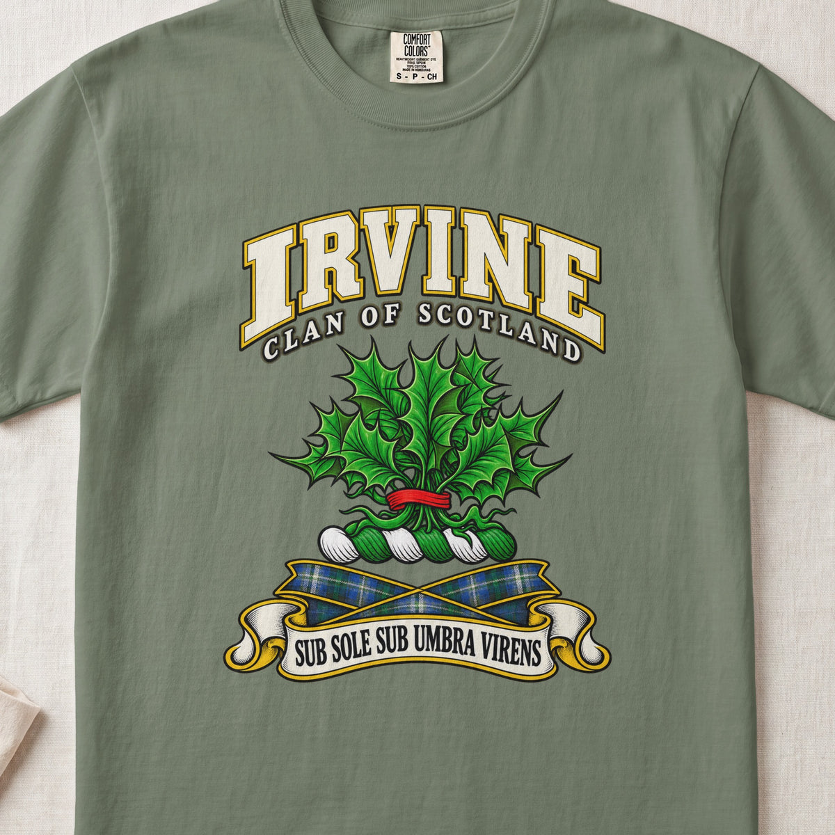 Irvine Scottish clan T-shirt in Moss, front view with green holly leaves with red berries and motto banner.