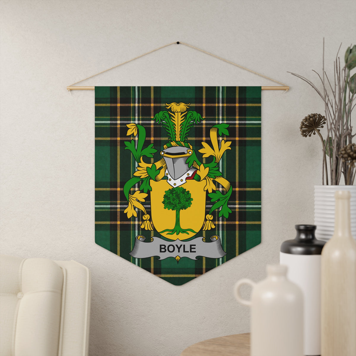 Boyle family crest on green plaid banner with grey scroll.
