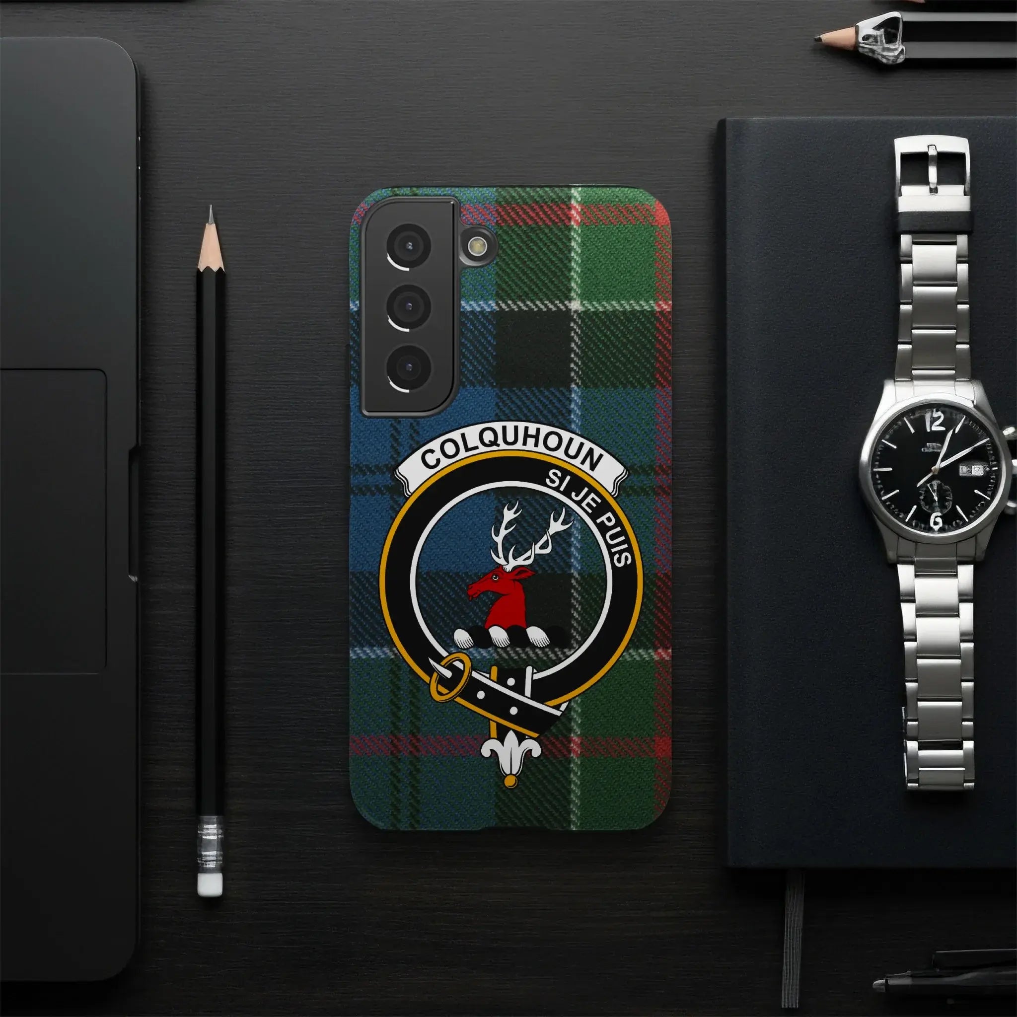 Colquhoun crest tartan phone case on iPhone and Samsung — glossy impact-resistant shell