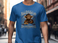 Scottish Highland cow wearing tartan, with text "Made of Shortbread and Stubbornness".