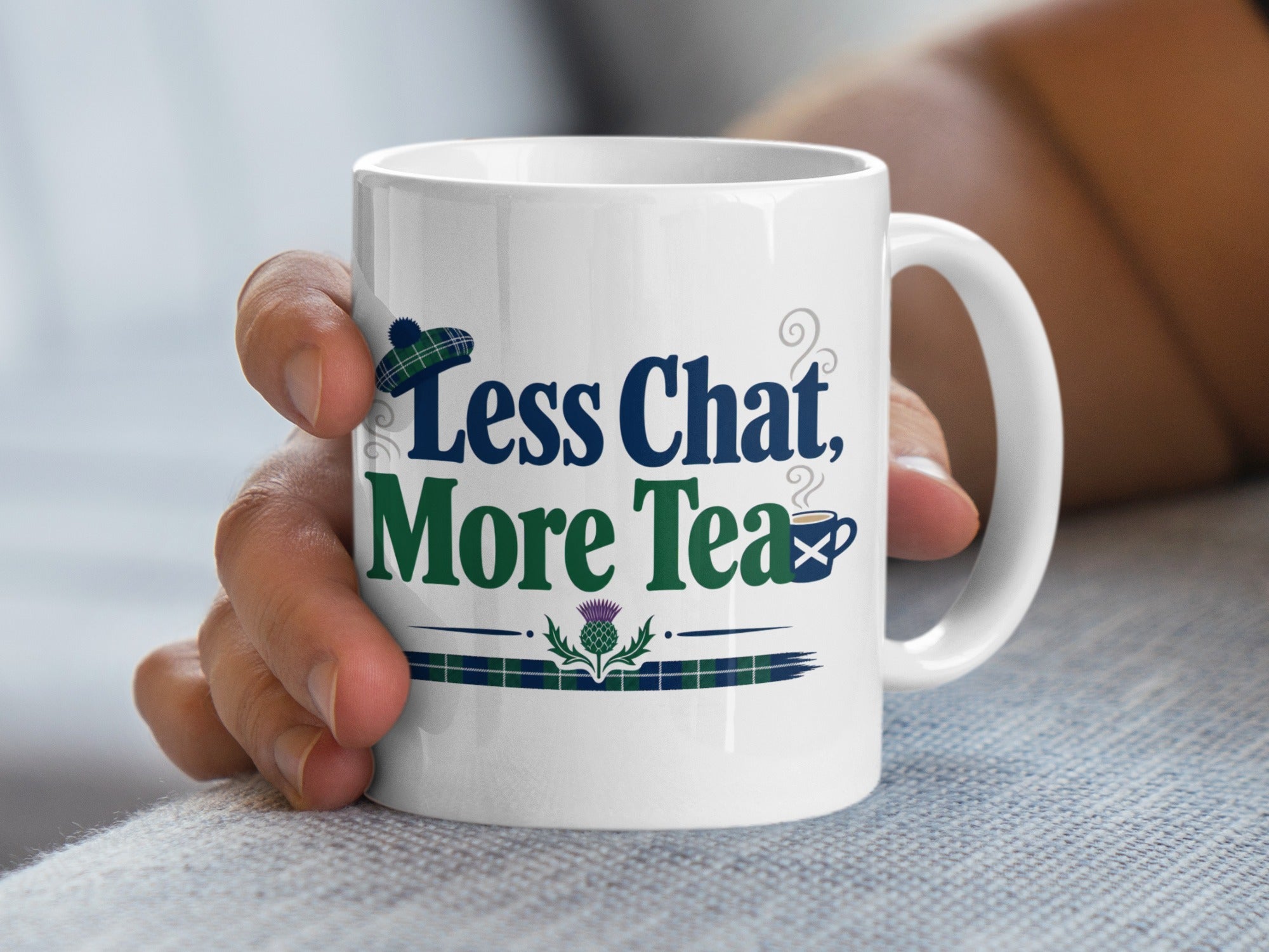 White mug with Scottish tartan and "Less Chat, More Tea" text.
