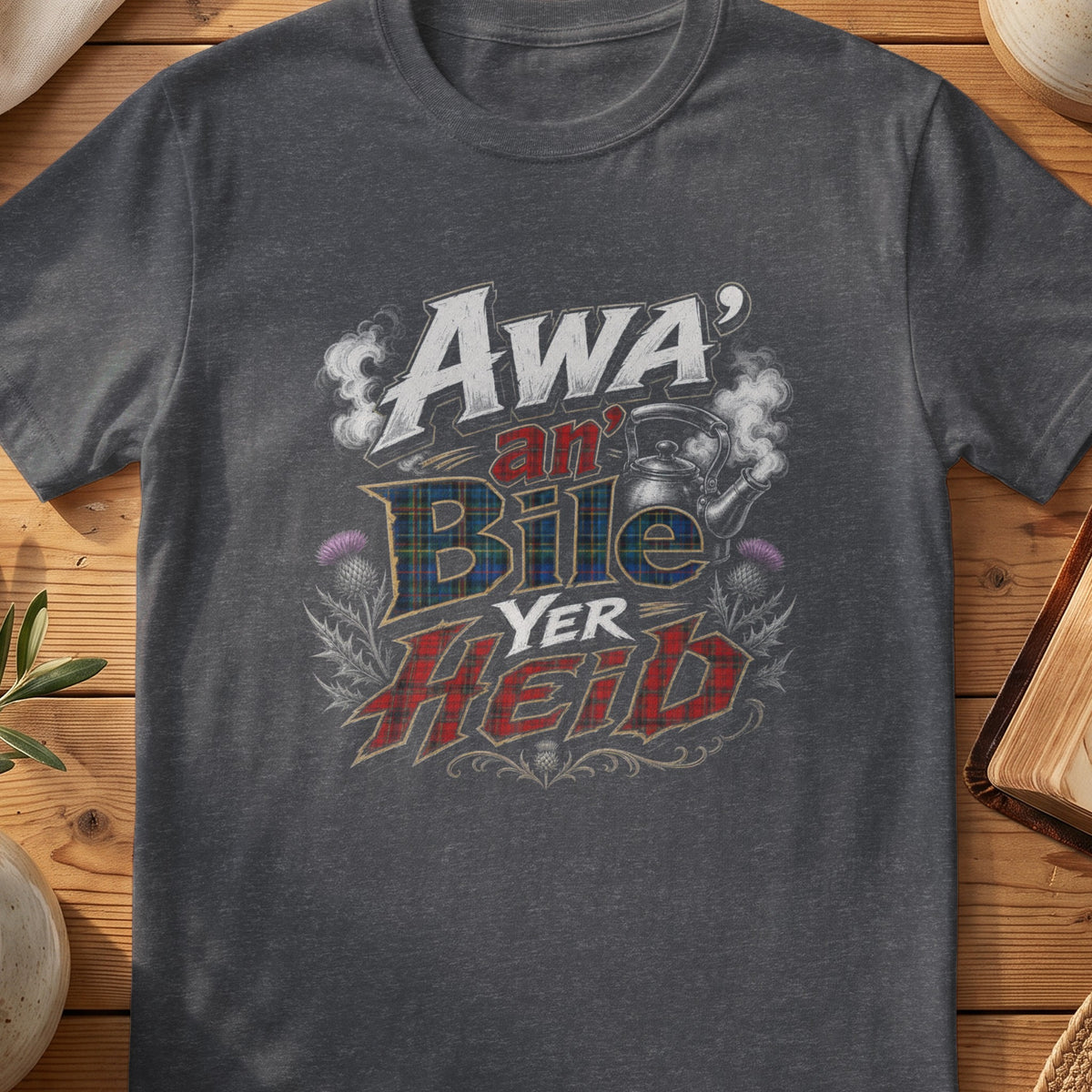 Dark grey Gildan 64000 unisex T-shirt flatlay with Awa an Bile Yer Heid Scottish graphic design