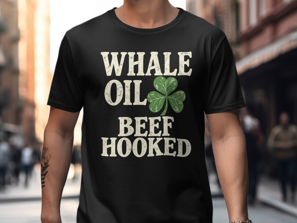 Black funny Irish T-shirt featuring “Whale Oil Beef Hooked” retro shamrock design.