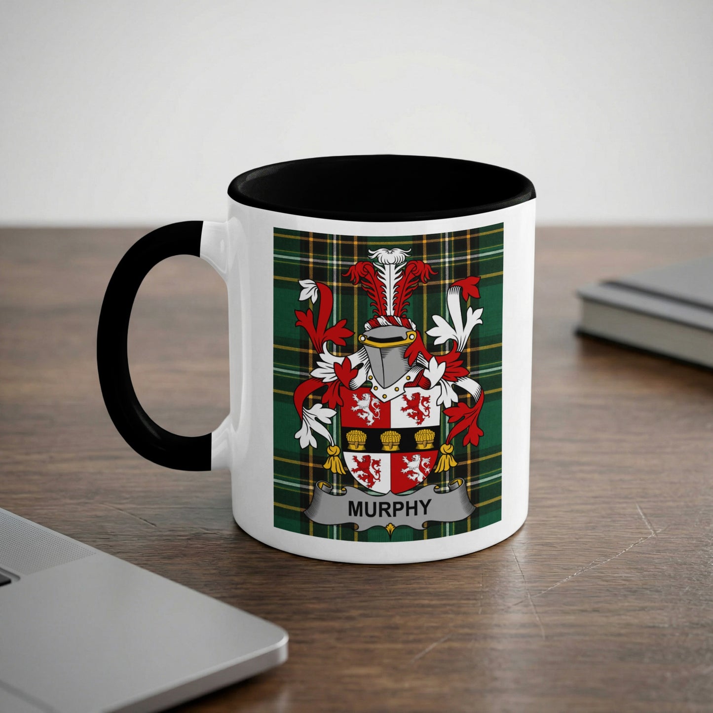 White mug with black handle displaying the Murphy coat of arms on a tartan background.
