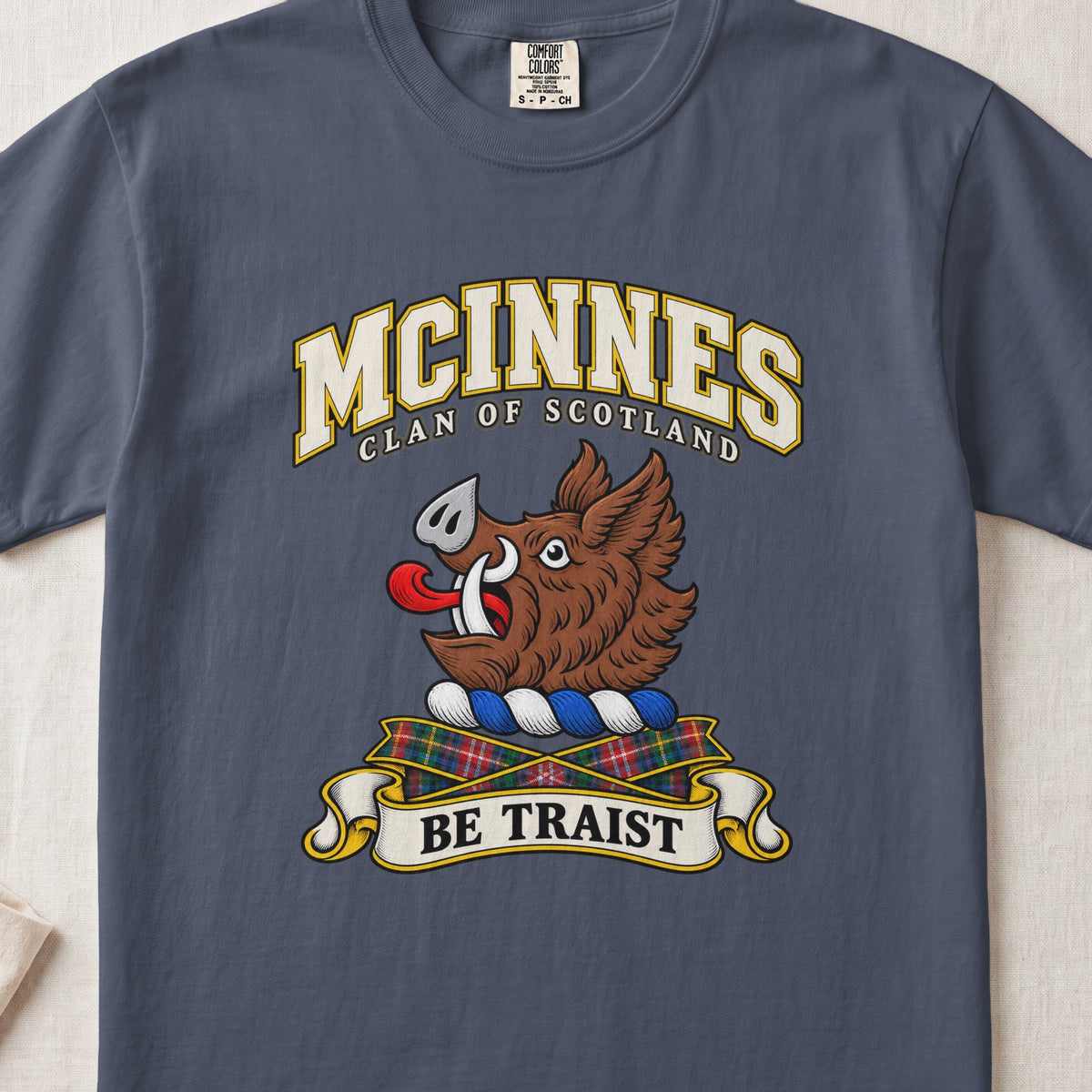 McInnes Scottish clan T-shirt in Midnight, front view with a brown boar head and motto design.