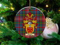 Baigrie Scottish clan ceramic ornament with family crest on a Caledonia tartan background, hanging on a Christmas tree