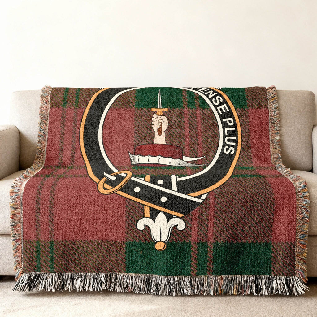 Erskine woven blanket draped over sofa — 60x50 size, fringe edges and tartan detail