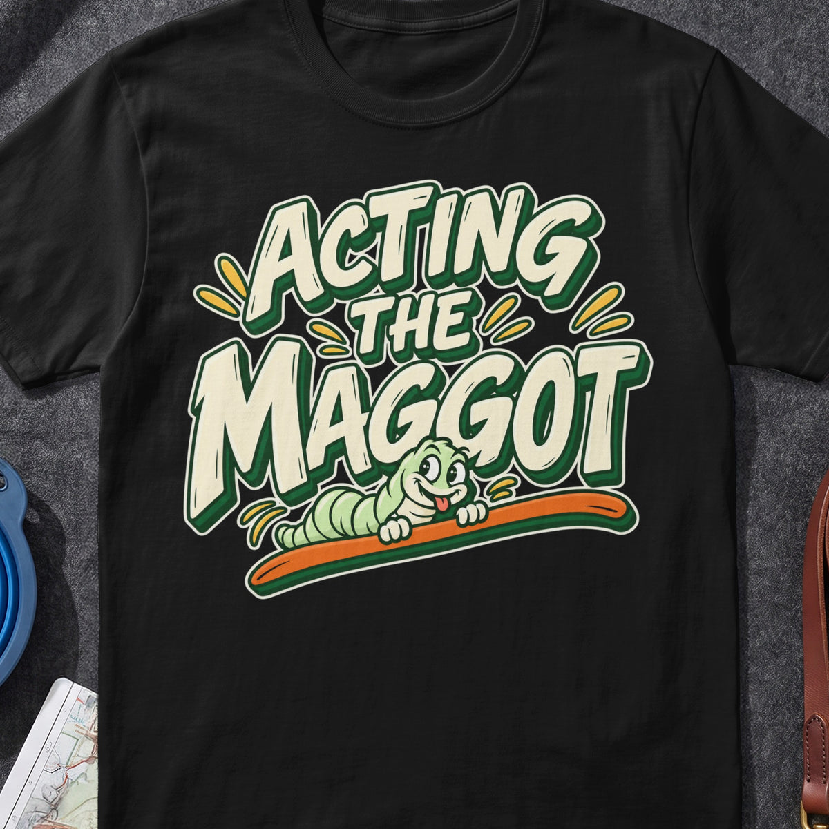 Acting The Maggot Irish graphic T-shirt in Black, flat-lay mockup