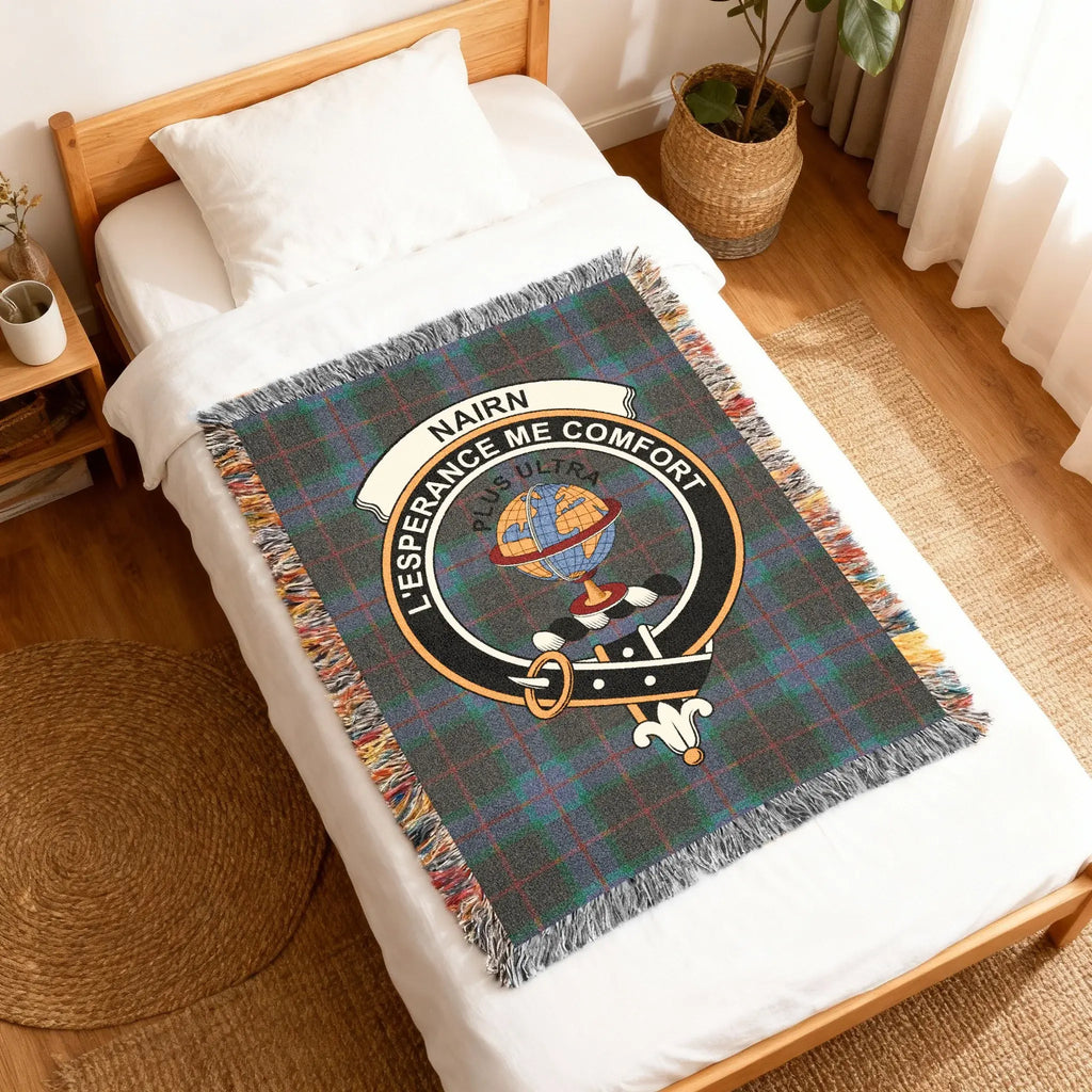 Nairn clan crest woven blanket — full-length view with fringe border, 80" x 60"