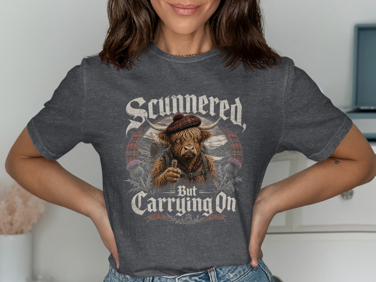 Highland cow wearing a tartan hat, text reads "Scunnered But Carrying On".