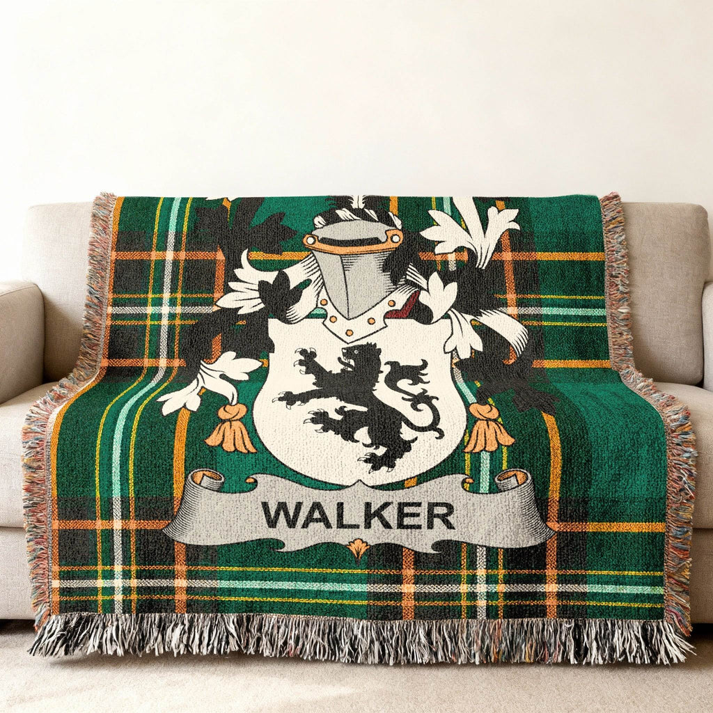 Walker family crest on a green tartan plaid throw blanket.