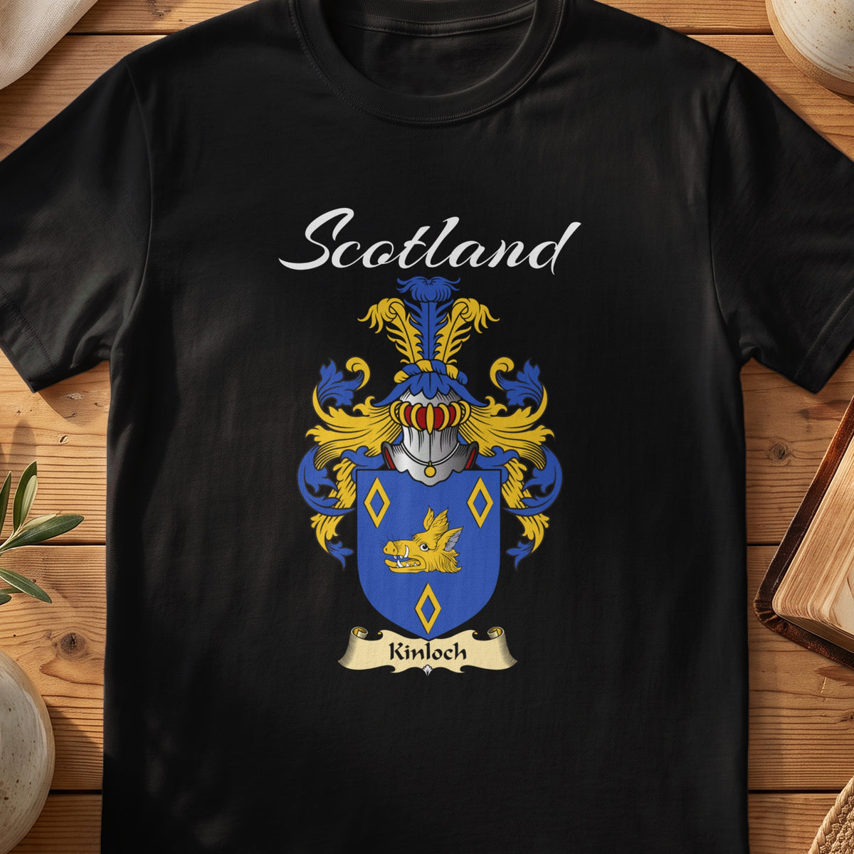 Black Kinloch Scottish T-shirt featuring a blue shield with gold diamond outlines