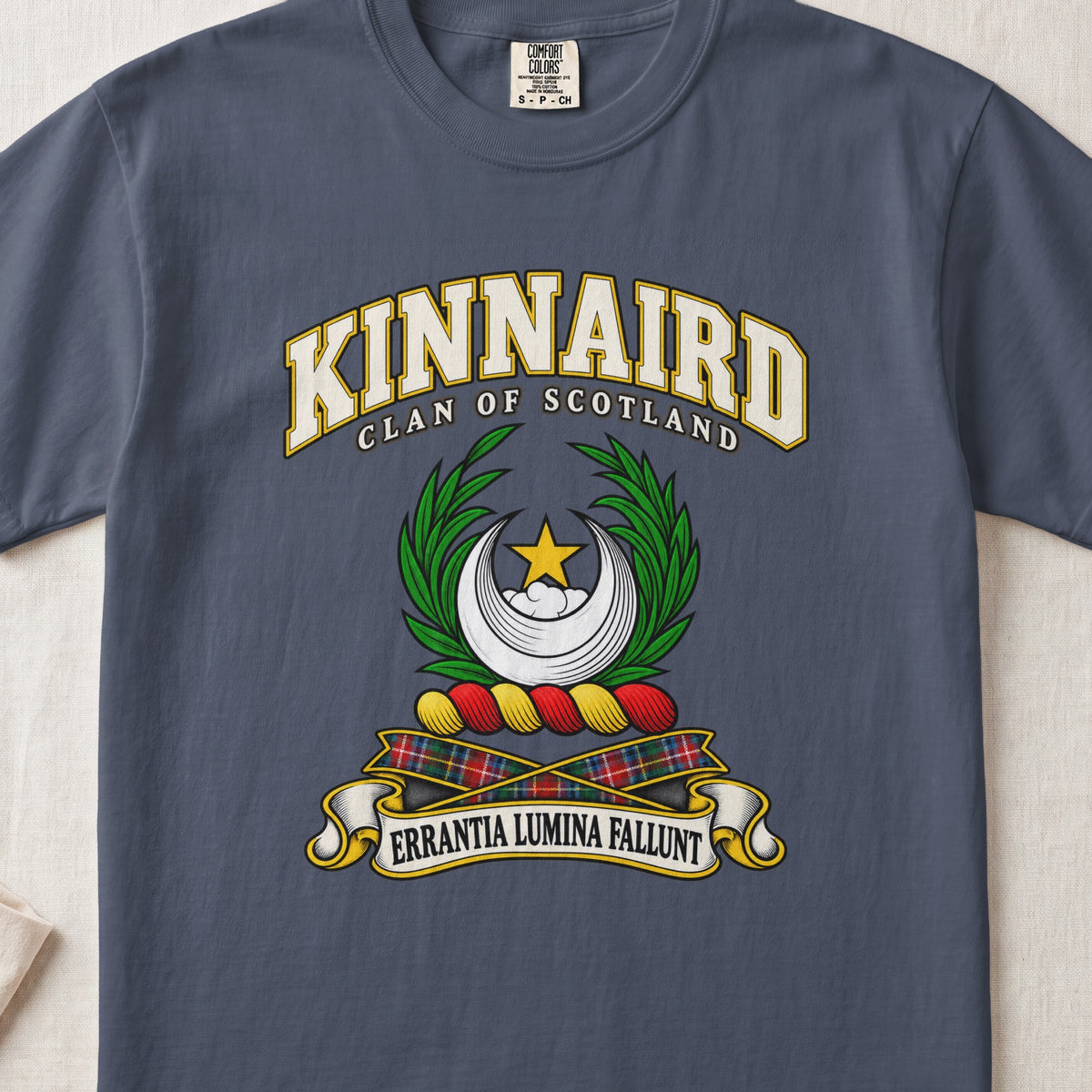 Kinnaird Scottish clan T-shirt in Midnight, front view with a silver crescent, gold star and green leafy branches and motto design.