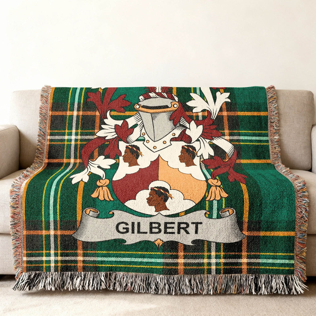 Green plaid throw blanket with the Gilbert family crest.