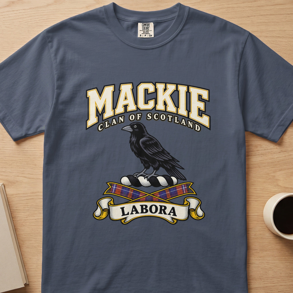 MacKie clan T-shirt in slate blue, front view with black bird above tartan ribbons